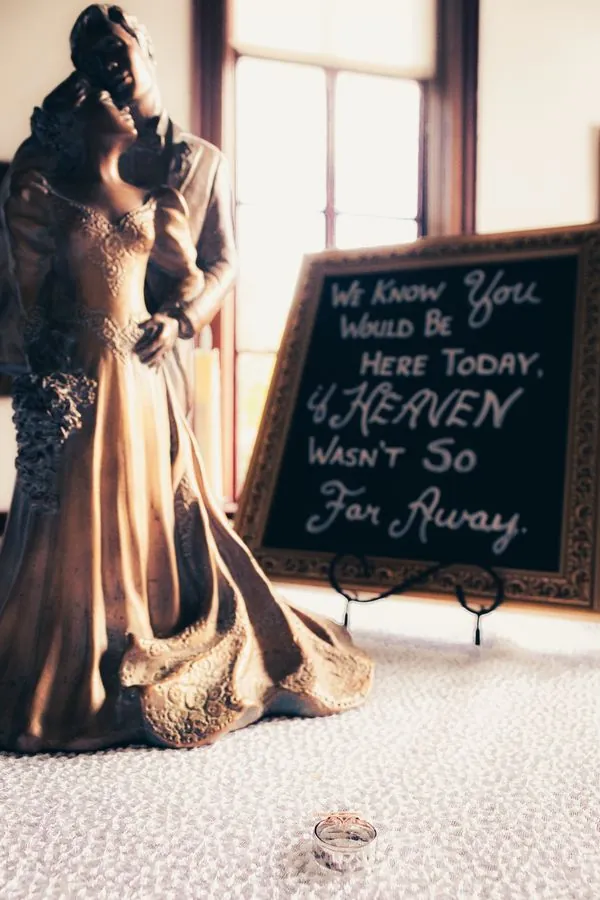 Wedding and engagement rings on a wooden table